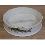 A pearlware char dish, 19th century, with transfer and hand coloured fish to exterior, diam. 17cm.