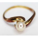 A Danish ring set with a cultured pearl, marked '585', gross wt. 2.17g, size L, with H Behrens "