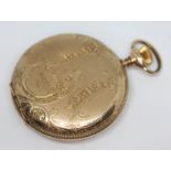 A gold plated full hunter pocket watch with engraved case, the dial signed 'Elgin', diam. 50mm.