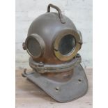 A copper and brass deep sea diver's helmet, height 48cm.