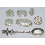 A mixed lot comprising four pill boxes marked '925', a continental novelty souvenir spoon with owl