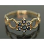 A hallmarked 9ct gold sapphire cluster ring, gross wt. 1.88g, size O.