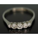 A five stone diamond ring, band marked '18ct' & 'PLAT', gross wt. 1.81g, size N.