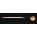 A hallmarked 9ct gold cameo stick pin, length 54mm, gross wt. 0.73g.