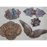 A group of four belt buckles including two Art Nouveau gilt metal and enamel, an eagle and another