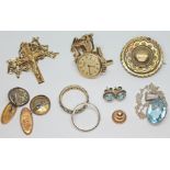 A mixed lot including hallmarked 9ct gold comprising a crucifix pendant on chain, a Majex wristwatch