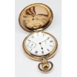 A gold plated Waltham Watch Co. pocket watch circa 1916, with Roman numerals on a signed white