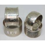 A group of four hallmarked silver serviette rings, wt. 2 3/4oz.