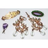 A mixed lot of costume jewellery including a pear cut amethyst pendant, a pair of vintage drop