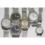 Five gents and one ladies Seiko 5 automatic day/date stainless steel wristwatches, all with