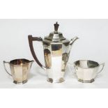 A three piece silver bachelors tea set comprising teapot, cream jug and sugar bowl, Ollivant &