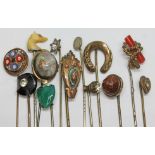 A group of 13 antique & vintage stick pins.