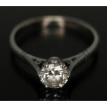 A diamond solitaire ring, the stone weighing approx. 0.67 carats, band marked 'PLAT', gross wt. 3.