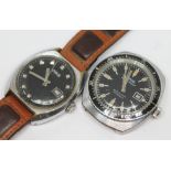 Two vintage Oris manual wind wristwatches, one with 35mm stainless steel case, signed black dial