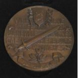 A WWII commemorative bronze medallion "Victoire De Normandie", diam. 68mm, with no matching case