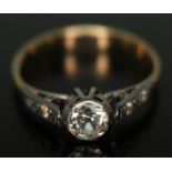 A diamond solitaire ring, the bezel set old European cut central stone estimated to weigh approx.
