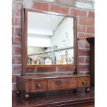 A George III boxwood strung mahogany toilet mirror with three drawers and ball feet, height 67cm.
