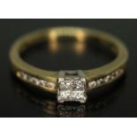 A diamond cluster ring, marked '18k', gross wt. 3g, size P.