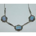 A white metal necklace set with opal triplet panels and marcasites, length 41cm.