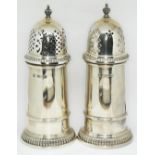 A three piece silver condiment comprising salt, pepper and sugar castor, Barker Ellis Silver Co,