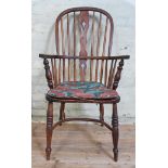 A 19th century ash Windsor chair with crinoline stretcher.