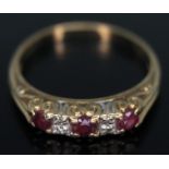 A hallmarked 9ct gold cluster ring, gross wt. 1.84g, size M.