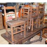 A set of six 18th century oak chairs.