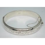A hallmarked silver bangle, approx. diam. 55mm. Condition - good, a couple of minor dings and