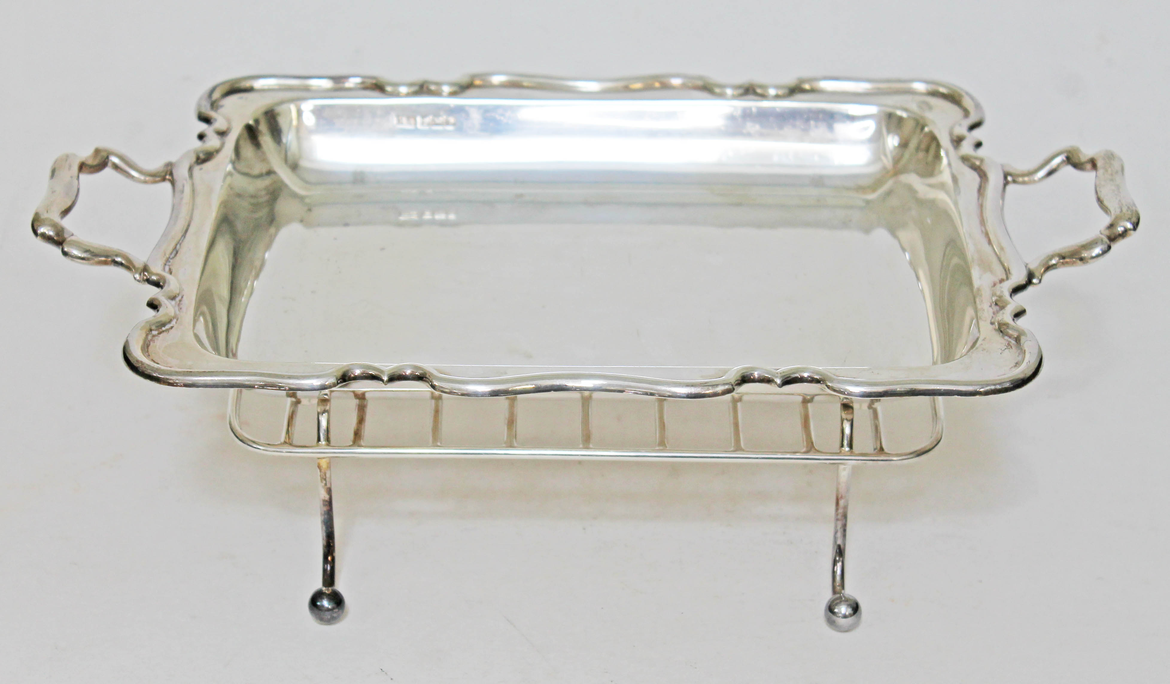 A George V twin handled asparagus dish with stand, Atkin Brothers, Sheffield 1915, length 34.5cm,