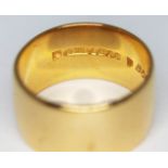 A hallmarked 22ct gold wedding band, wt. 13.09g, size P/Q. Condition - good, no evidence of