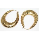 A pair of 9ct gold Pat Butcher style earrings, 9ct gold import marks, length 44mm, wt. 5.44g.