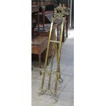 A late 19th century brass easel, numbered S897, height 193cm.
