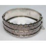 A hallmarked silver bangle, diam. 5.5cm.