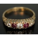 A diamond and ruby ring, band marked '18ct', gross wt. 4.18g, size P.