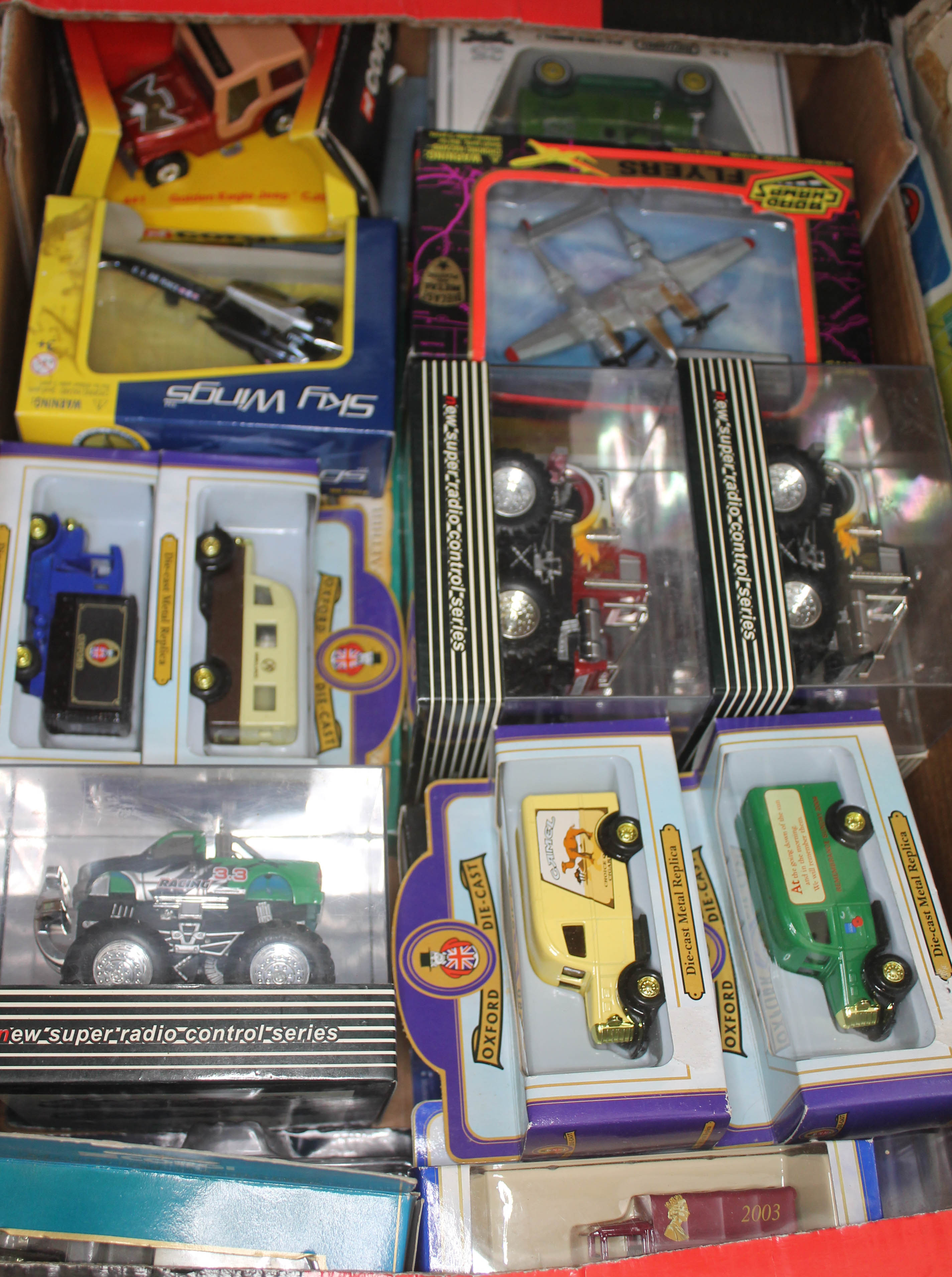 A box of boxed die cast model cars - approximately 20 imcluding Oxford die cast, Corgi, and remote