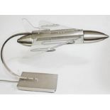 A modern desk lamp formed as a jet plane, length 55cm.