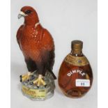 A 13.5 fluid ounces bottle of John Haig Dimple whisky with a Gleneagles Golden Eagle decanter