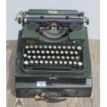 A Royal portable typewriter in original hard case.