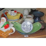 A collection of mixed pottery including Carltonware Father Christmas teapot, SS Carlton teapot,