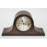 A domed mantle clock with steel dial.