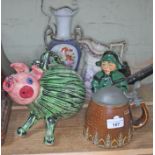 Five pieces of mixed pottery including a Merkelbach tankard, an Italian vessel formed as a pig etc.