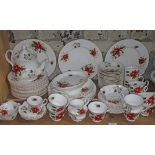Royal Albert Poinsettia tea set and dinnerware - approximately 78 pieces