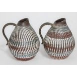 A pair of hand made jugs marked Dee-Cee Germany, height approx 7.5 inches