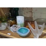 A collection of glassware including a French Vannes bird, an iridescent glass bowl and various