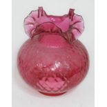 A cranberry glass oil lamp shade with crimped rim, height approx 9.5 inches
