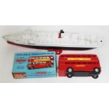 A plastic model toy QEII, length 46cm and a Fairylitefriction motor boxed London Bus.