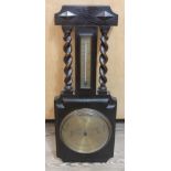 An oak aneroid barometer, the dial signed 'W. Greenwood & Sons', length 69cm.