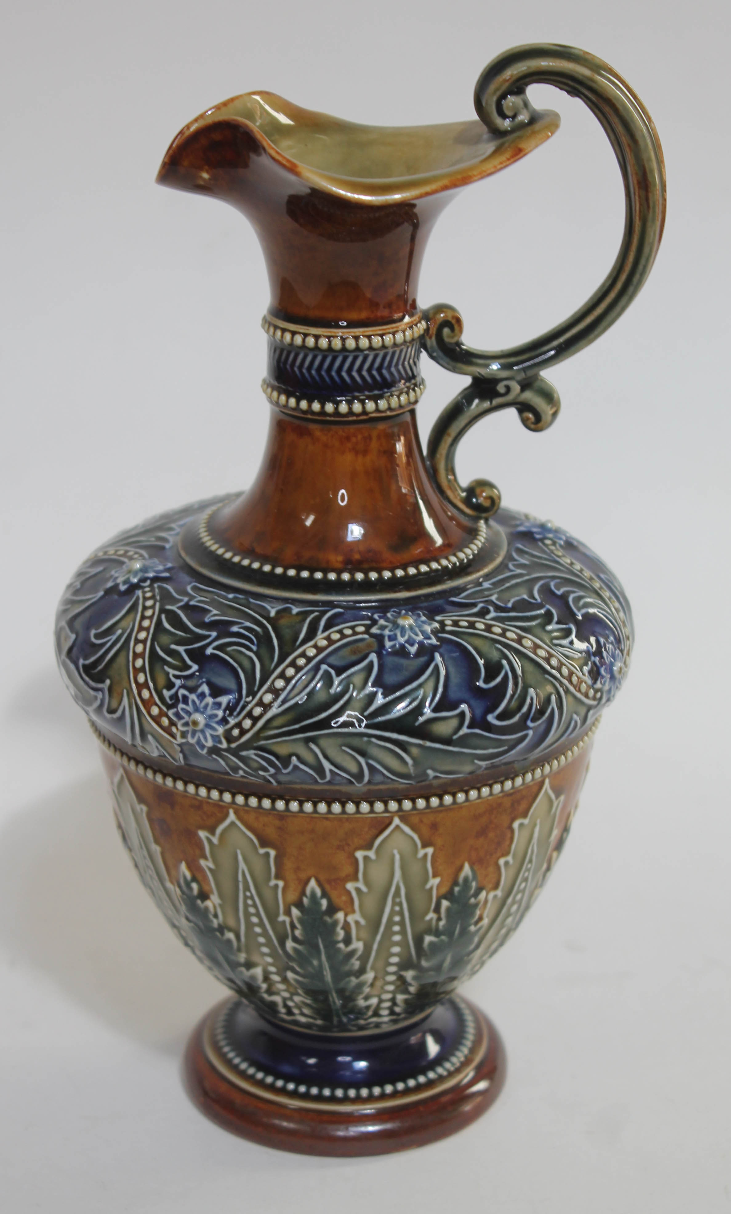 A Doulton Lambeth Art Union of London stoneware ewer, height 23cm.