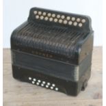 A Hohner Erica accordion.