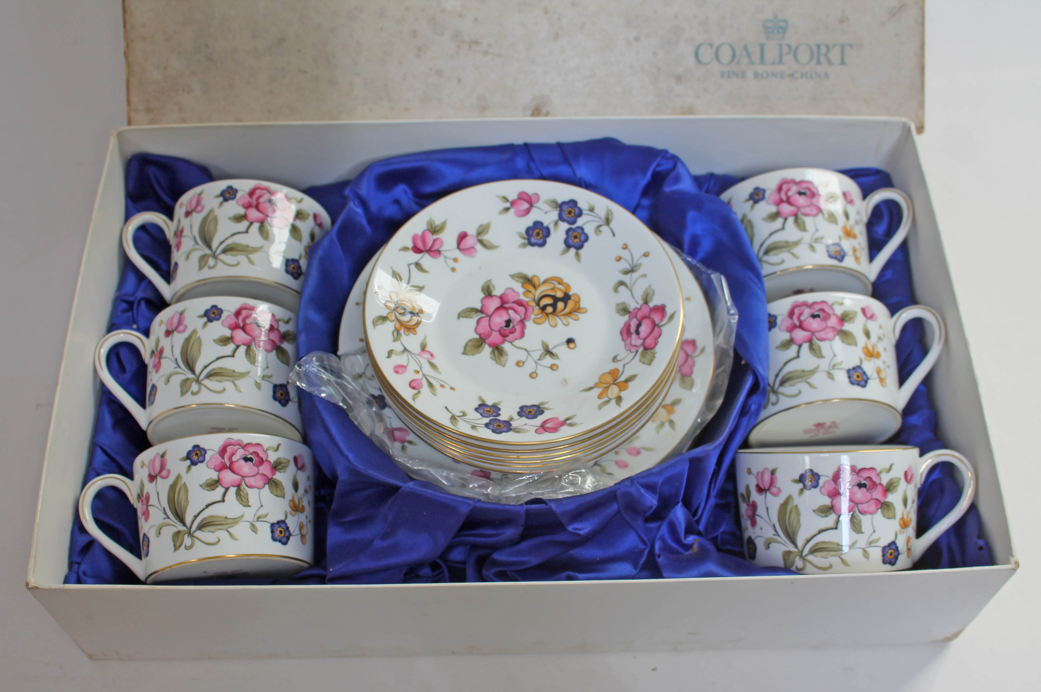 A boxed set of six Coalport San Remo trios.